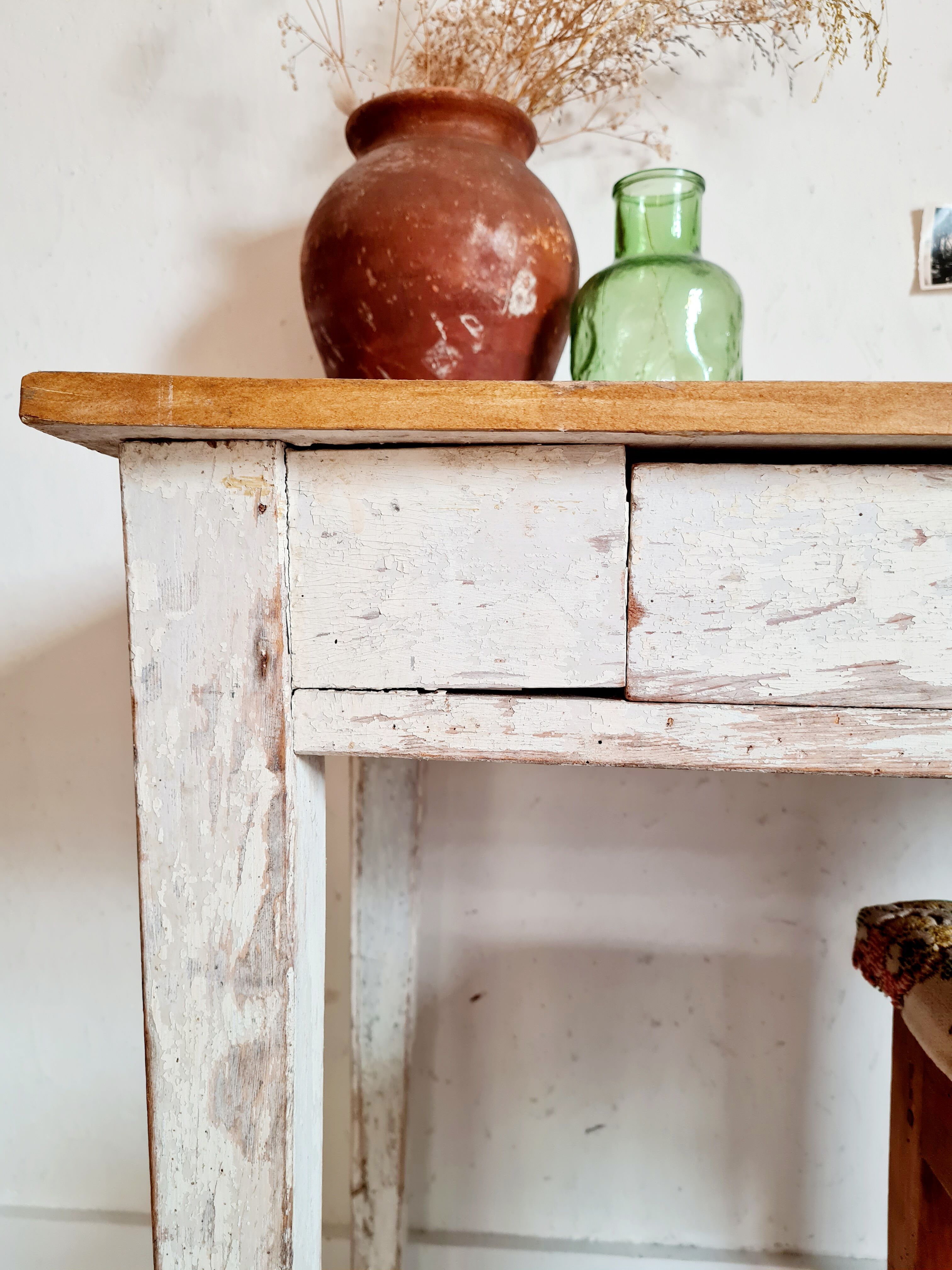 Skated white footing farm table