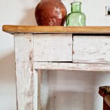 Skated white footing farm table