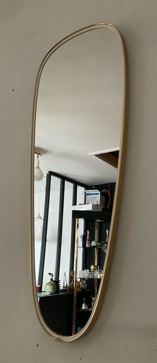 Asymmetrical free-form mirror from the 60s