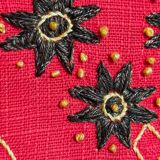 Vintage hand embroidered canvas cushion