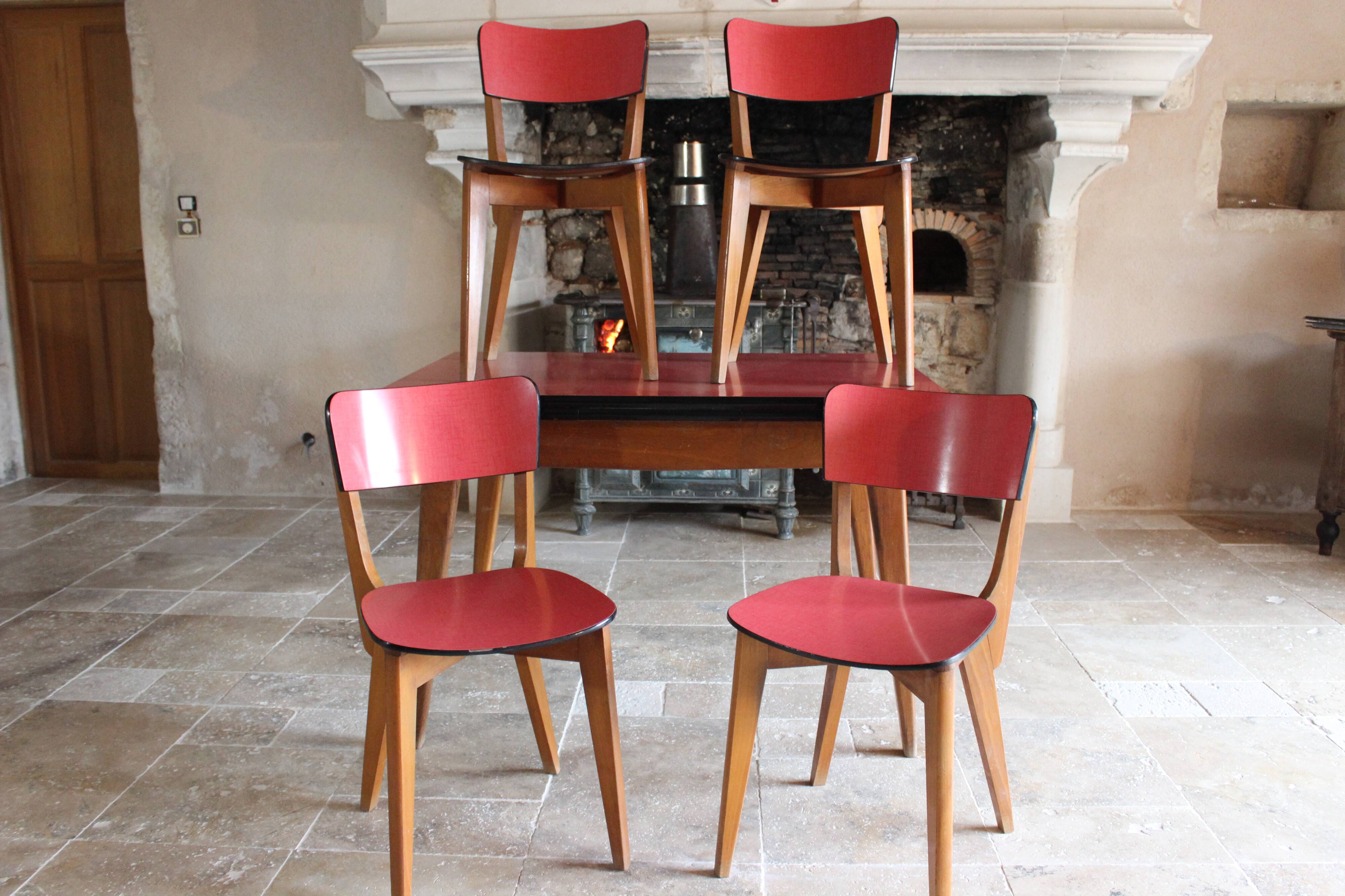 Kitchen table and its 4 chairs in wood and red formica, 1950