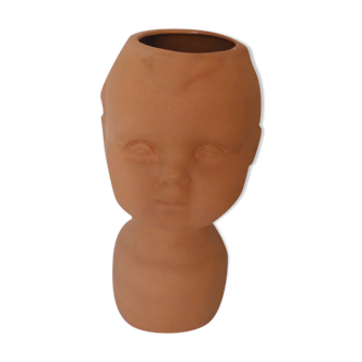 Terracotta vase shape child's head, baby