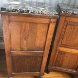 Set of 2 old oak bedside tables above black marble plaque