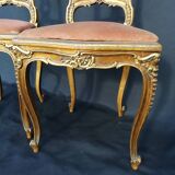 Pair of old canne chairs in gilded wood