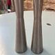 Pair of aluminum candlesticks