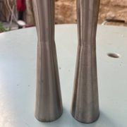 Pair of aluminum candlesticks
