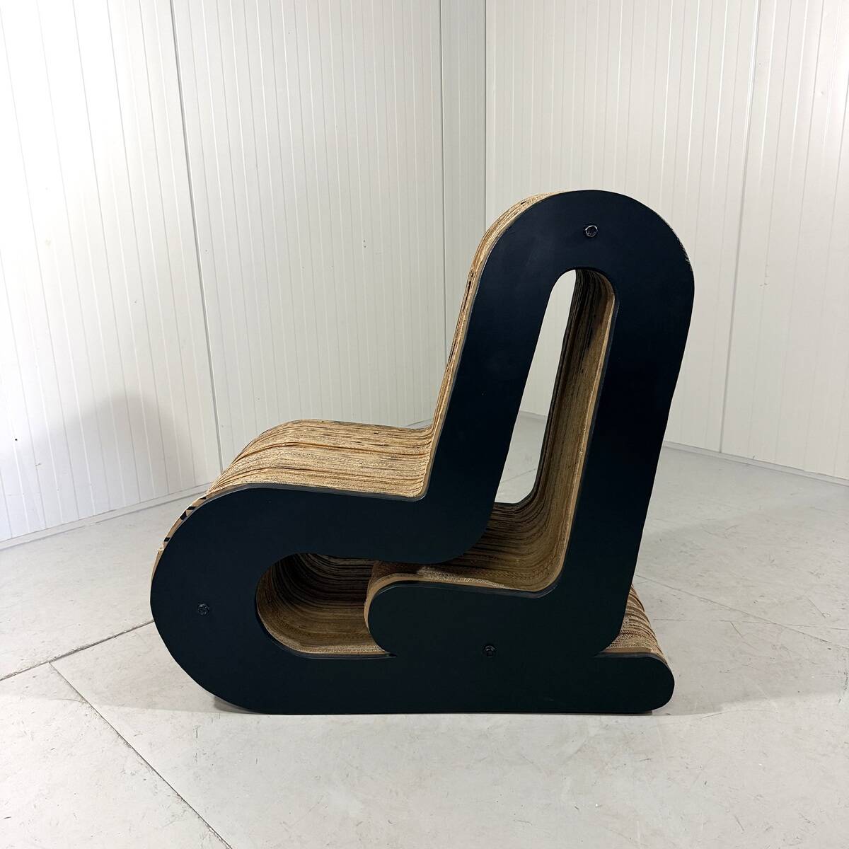 Sculpted cardboard & plywood lounge chair, 1990’s