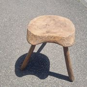Old wooden tripod stool