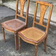 2 Art Deco chairs from the 1930s, made of solid wood with caning.