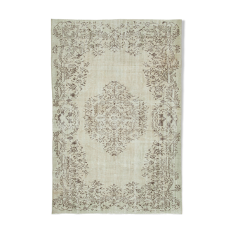 Handmade vintage oriental beige carpet 176 cm x 257 cm