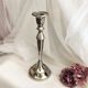 Chromed metal candle holder