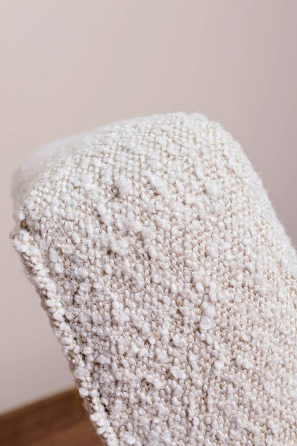 Vintage armchair in pearl white bouclé with walnut wood, 1960.