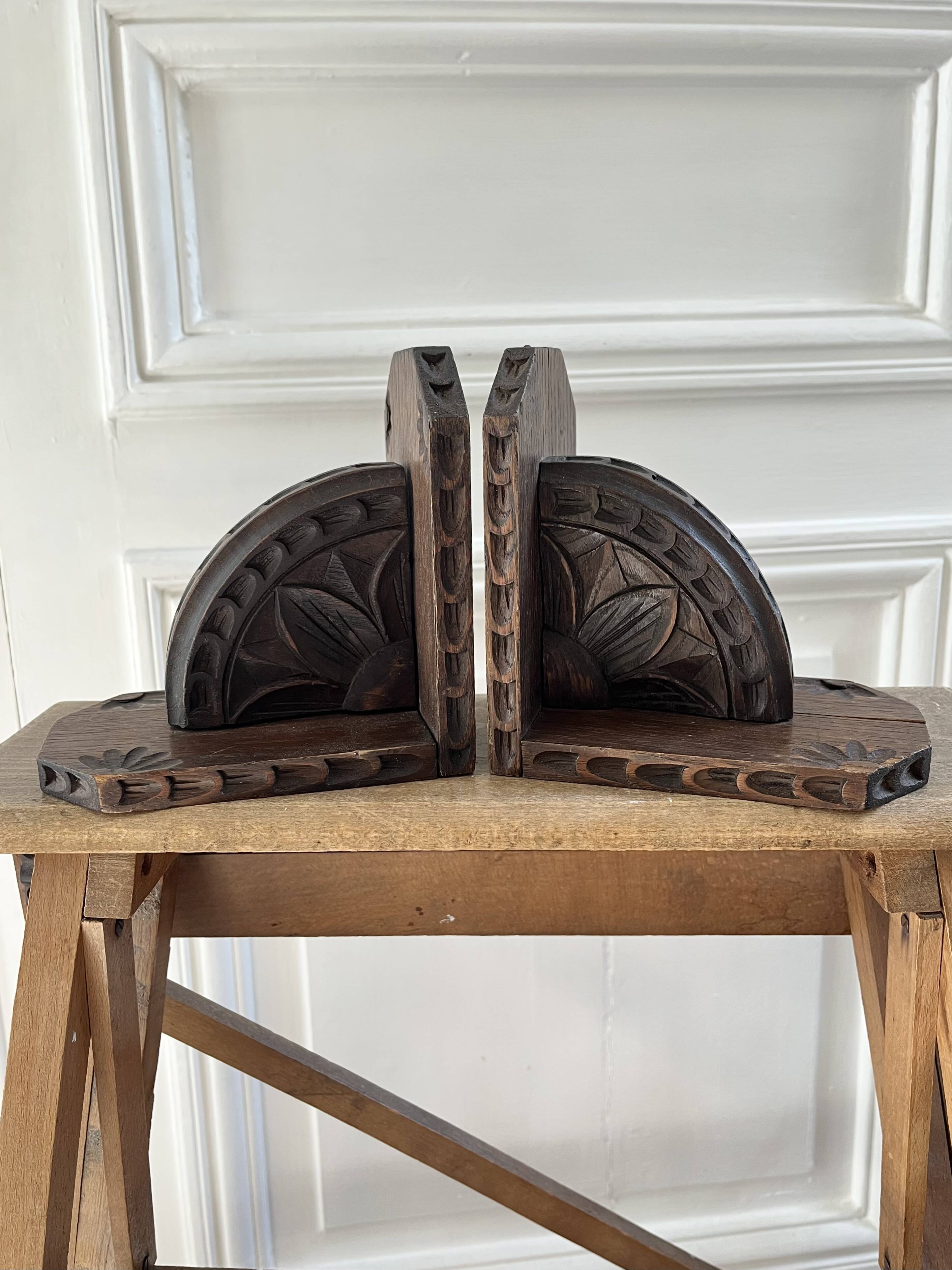 Pair of carved wooden bookends