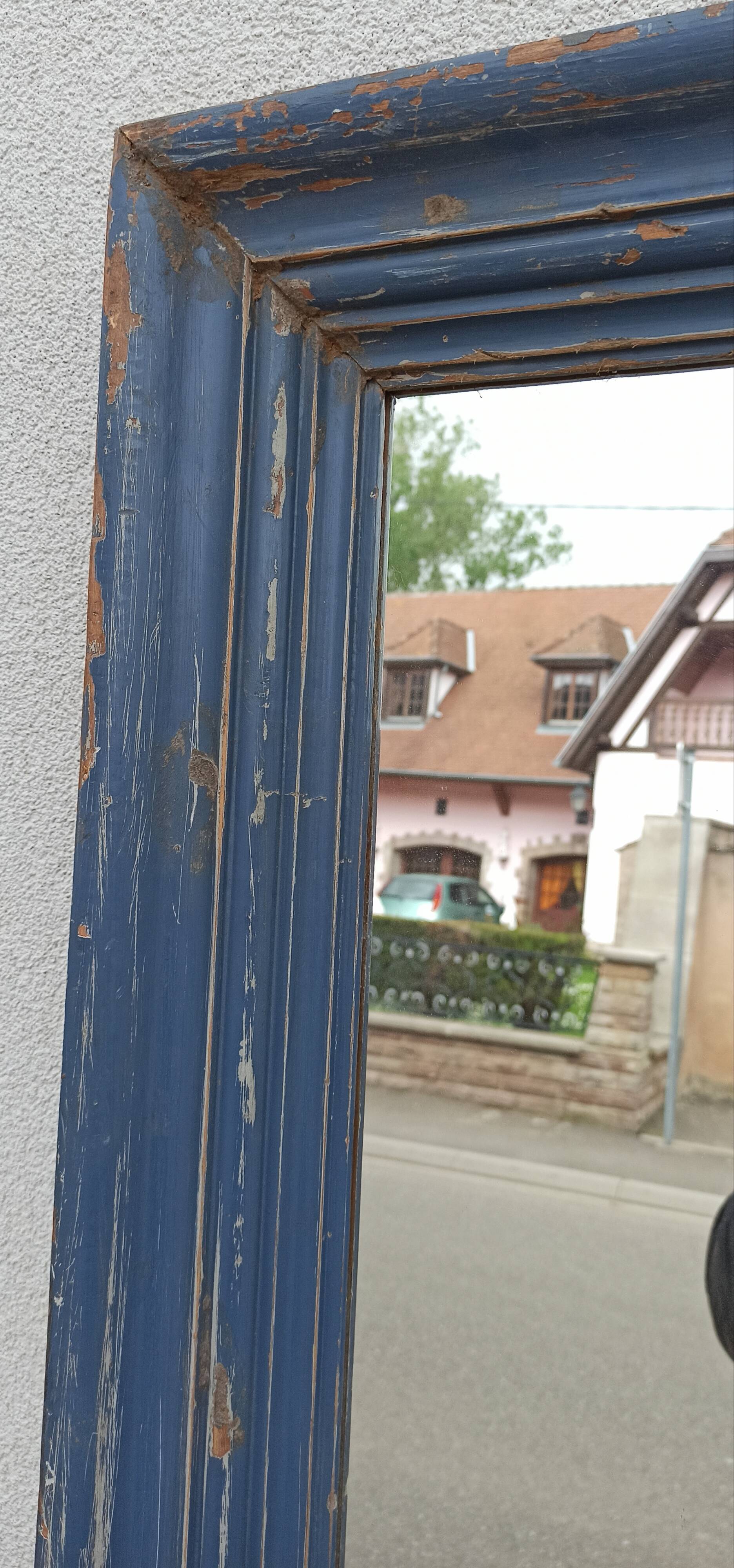 Old blue wooden mirror