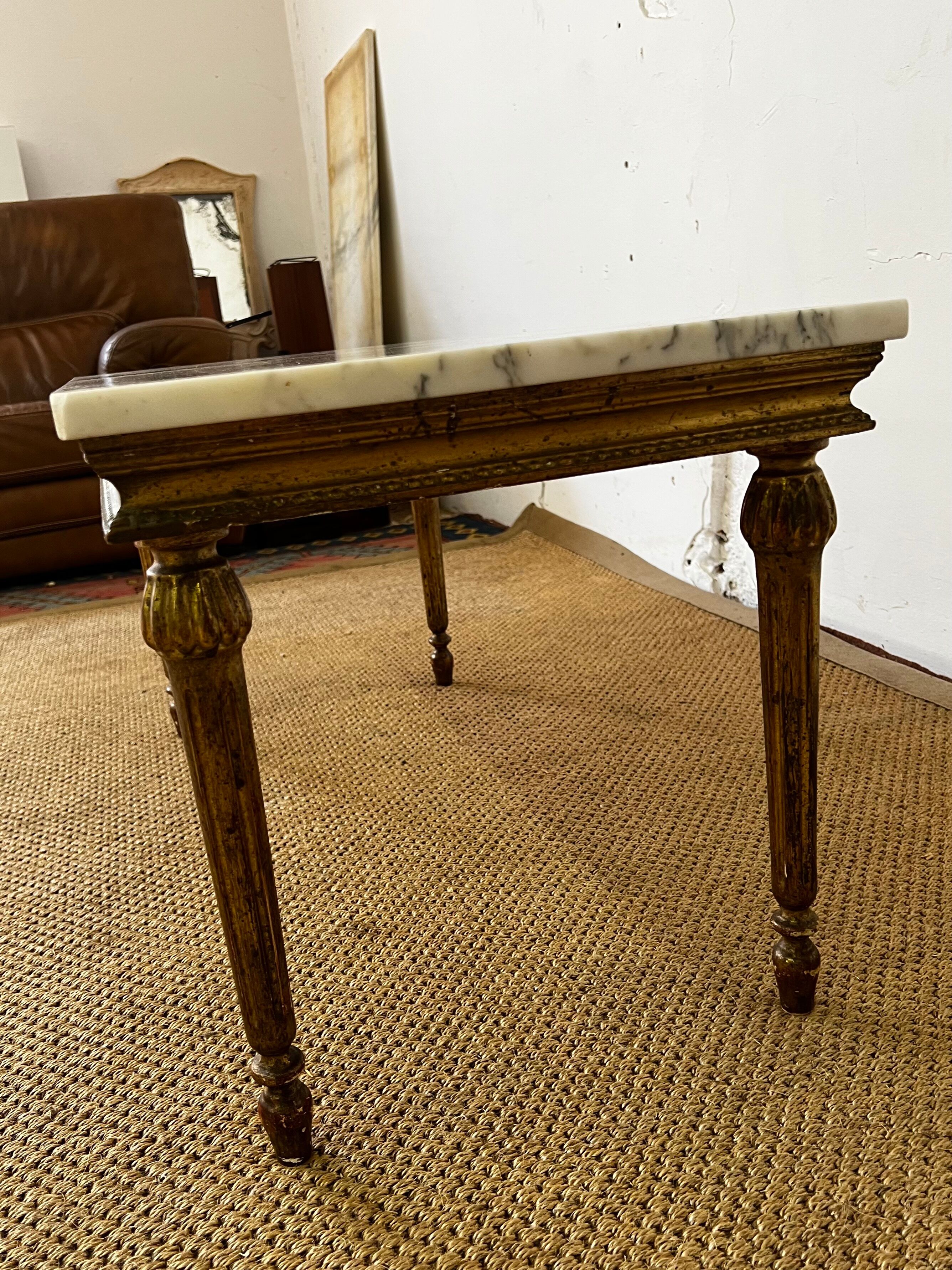 Gilded wood coffee table and marble top Louis XVI style