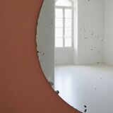 Large vintage chiseled round mirror