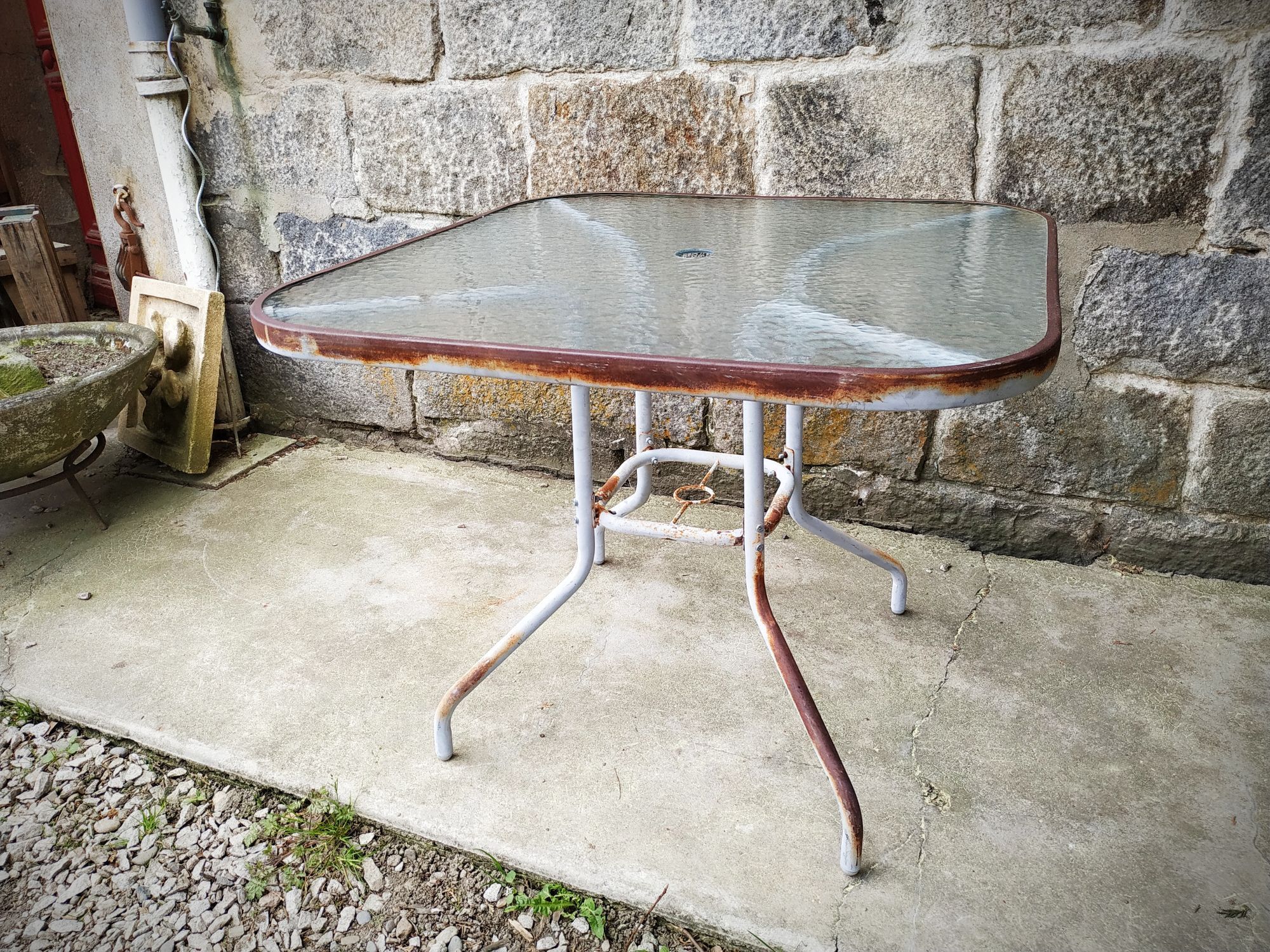 Old garden pedestal table