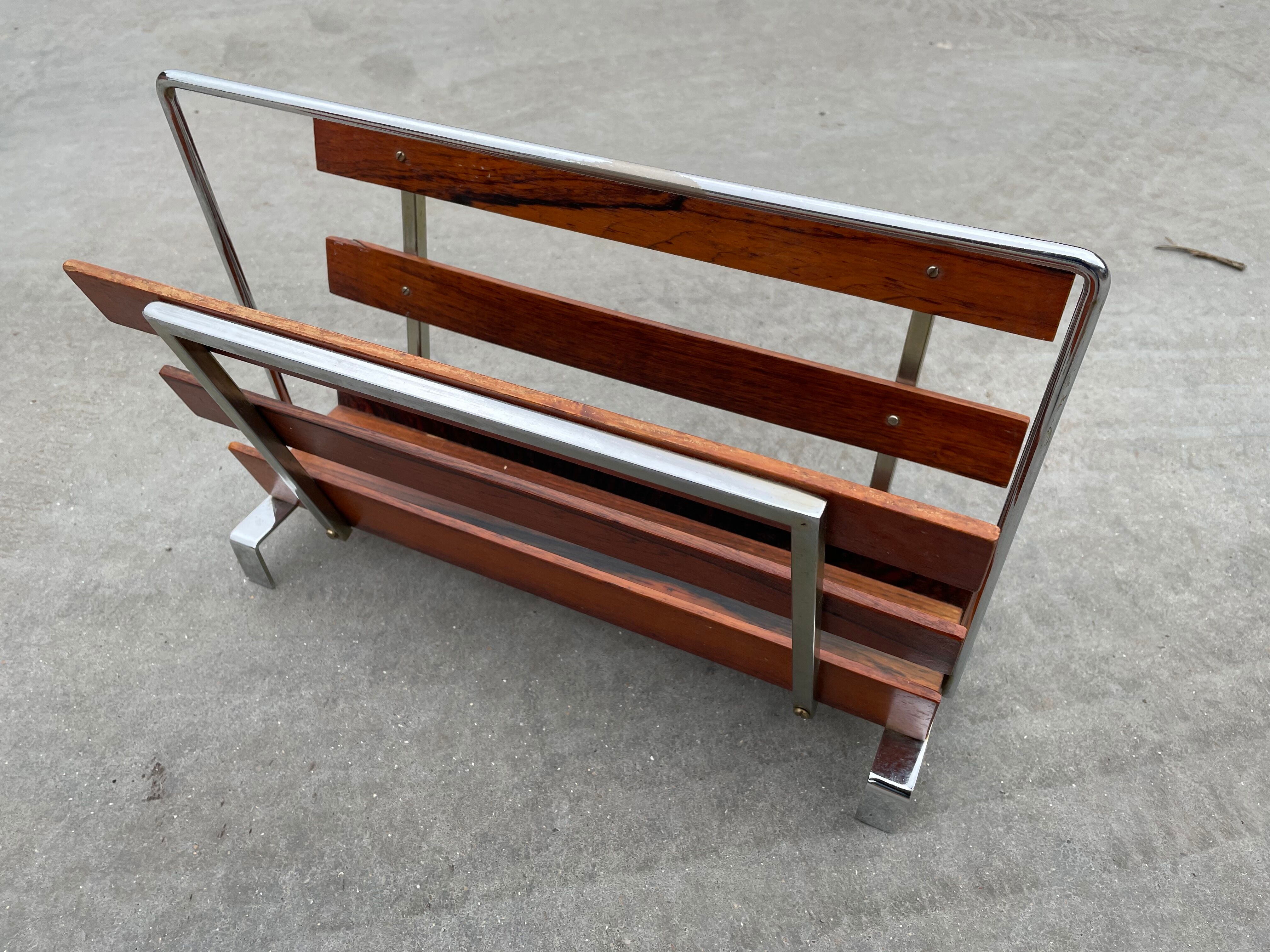 Vintage magazine rack from  rosewood and chrome design