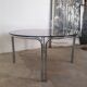 Round chrome and smoked glass coffee table