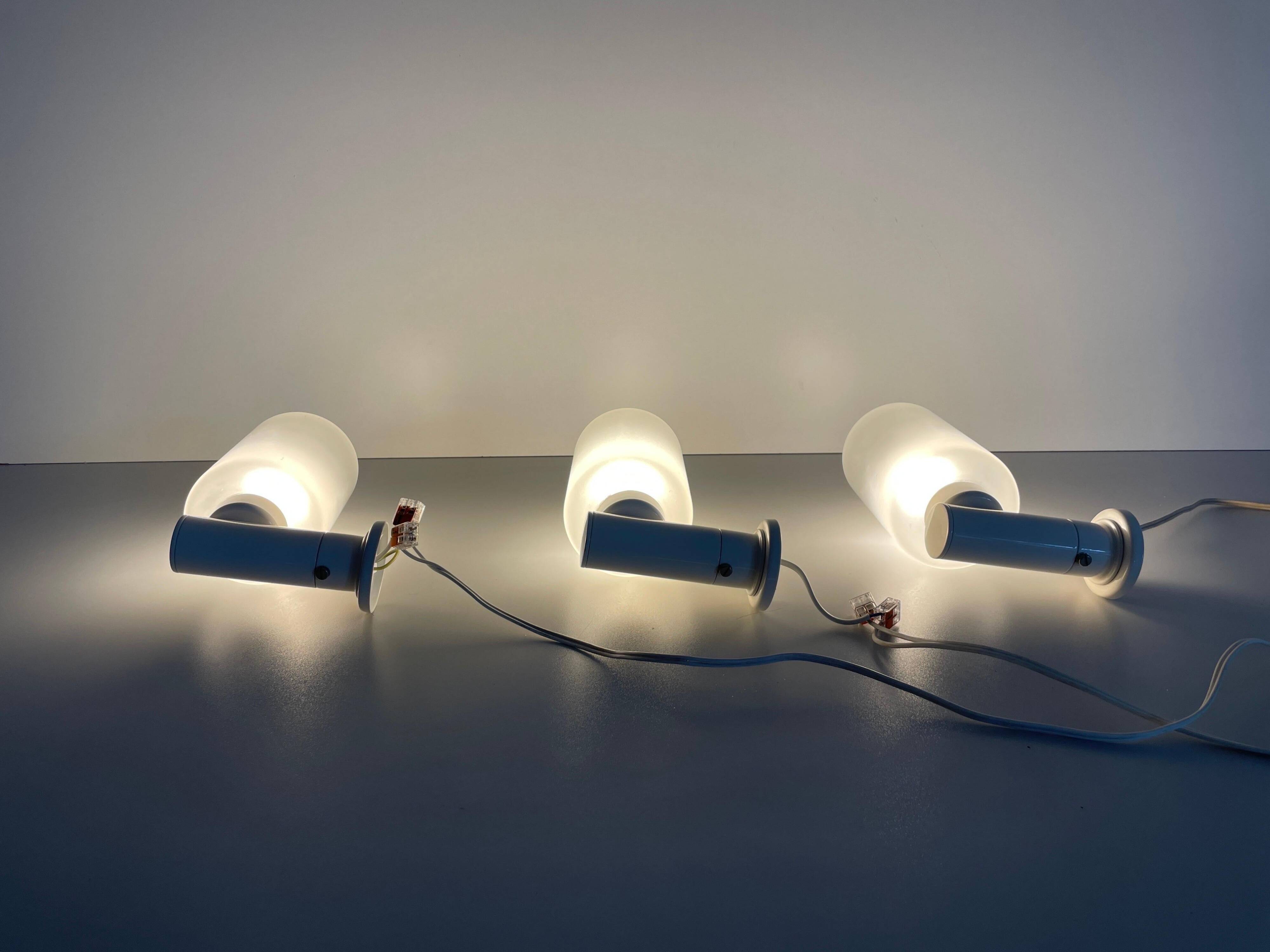 Set of 3 semi-transparent glass and white metal wall lights, 1960, Germany