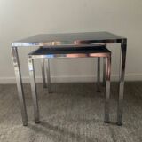 Pair of nesting tables in chromed metal and glass