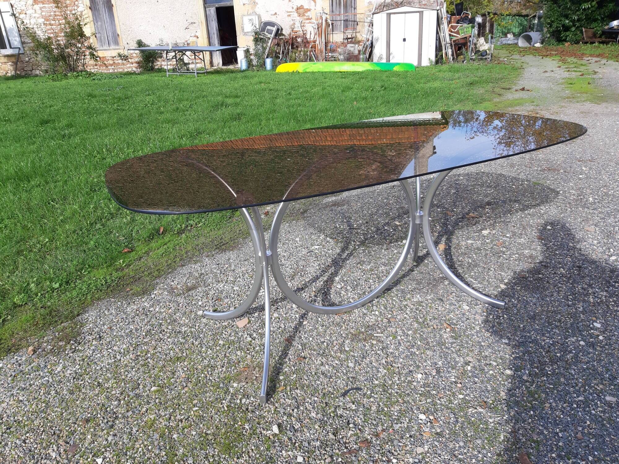 Vintage table of the 70s in chrome and smoked glass