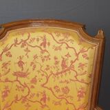 Pair of Louis XVI Bergères in walnut, late 18th century.