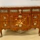 Transition chest of drawers with floral marquetry and music trophy