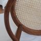 Curved wooden bistro and canne seating
