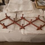 Extendable wall coat rack