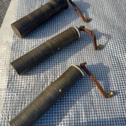Three oriental brass and iron pepper mills XIX century