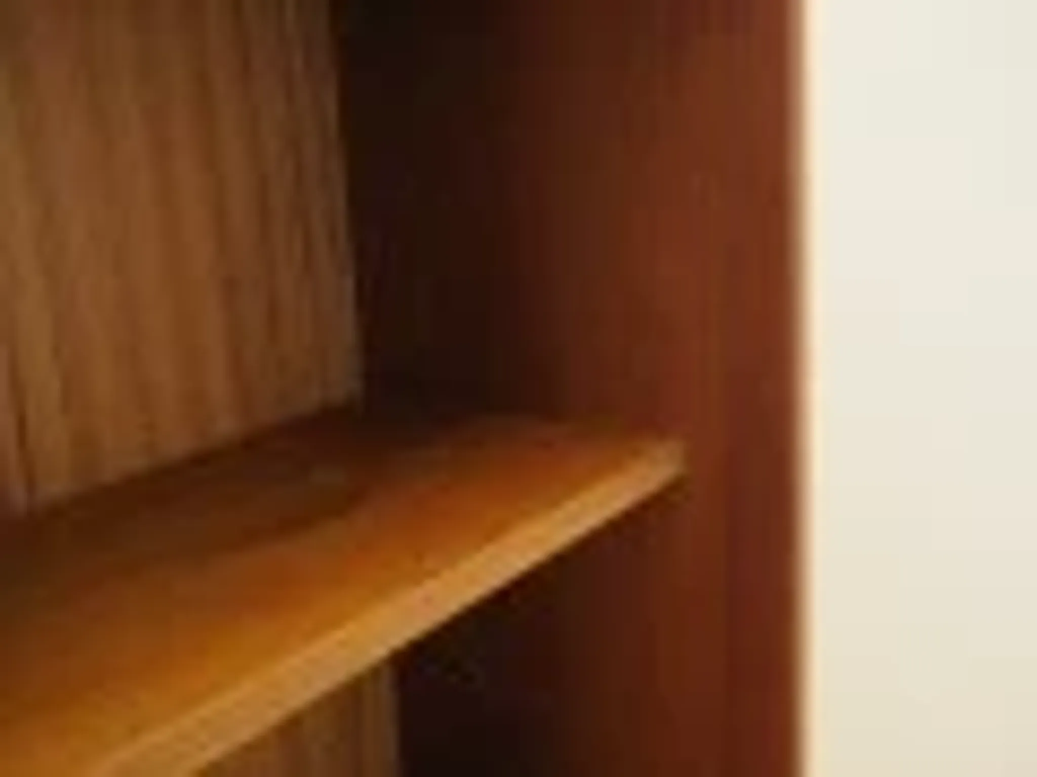 Danish teak veneered bookcase with sliding doors, 1970s