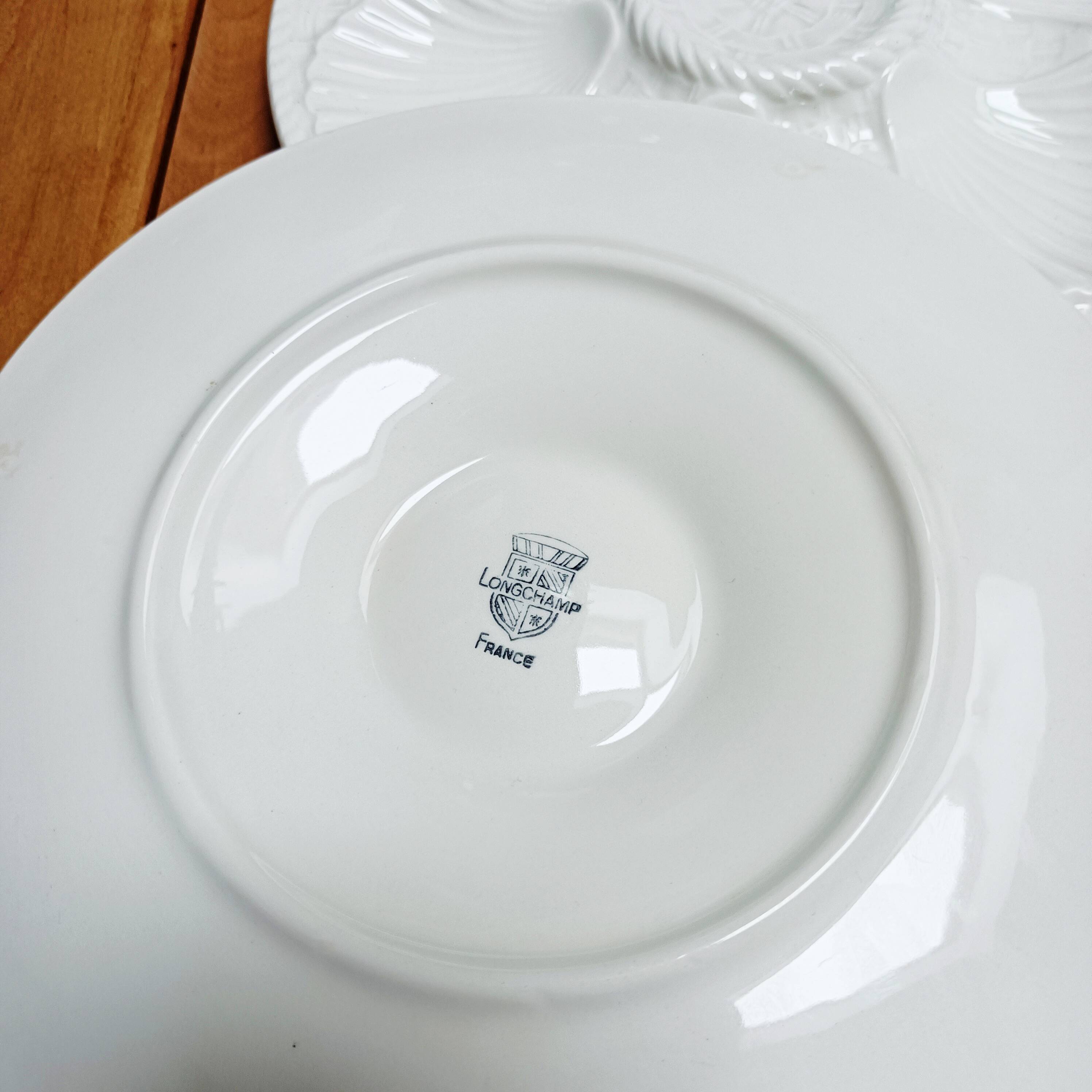 Set of 6 white oyster plates, Longchamp