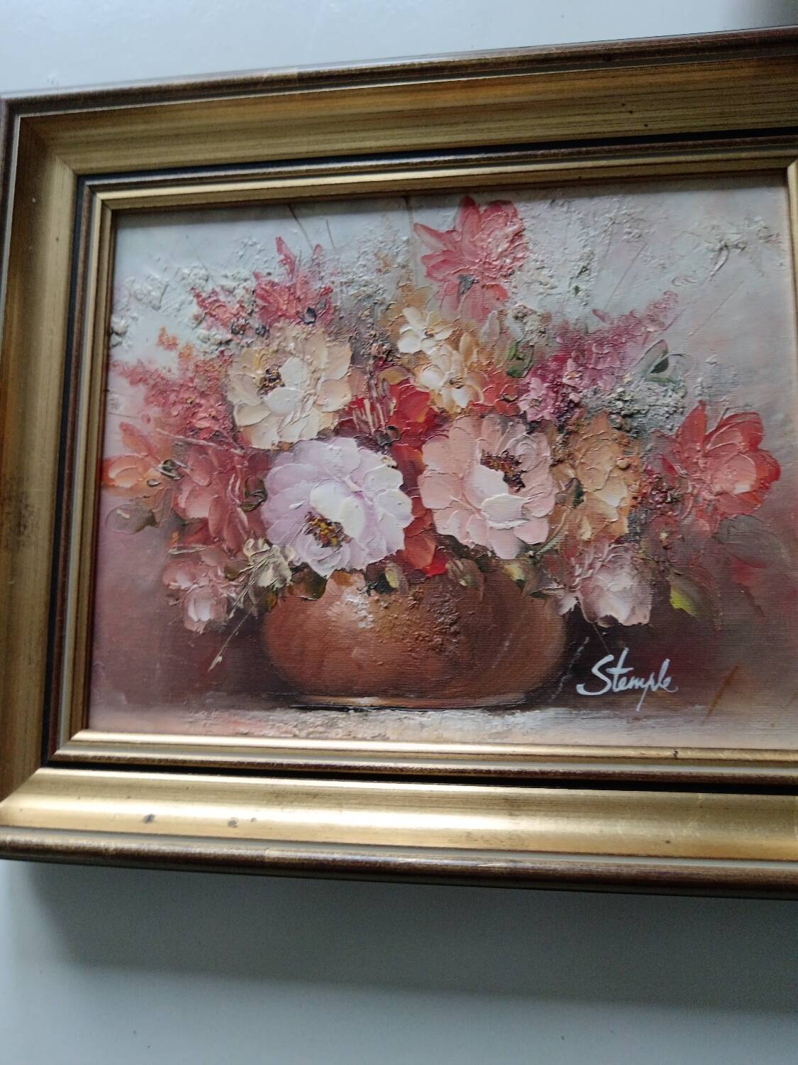 Oil of a bouquet and its lovely frame