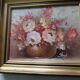 Oil of a bouquet and its lovely frame