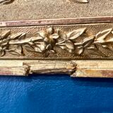 Mirror XIXth medallion on gilded frame with leaf