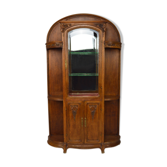 Art nouveau sculpted oak showcase, circa 1905