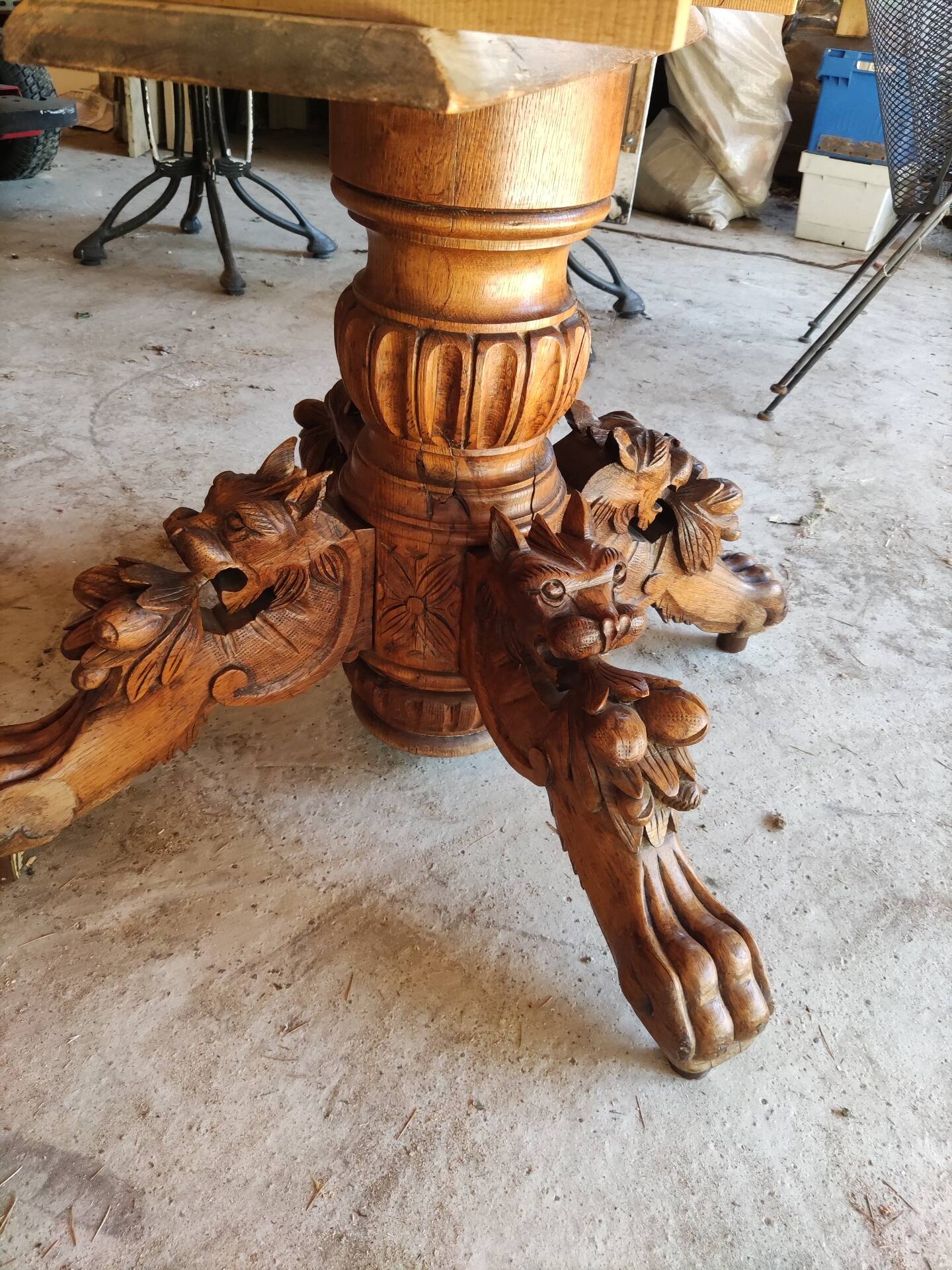 Oval oak table with carved details - known as a hunting table.
