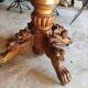 Oval oak table with carved details - known as a hunting table.