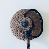 Ancient Japanese teapot in cast iron