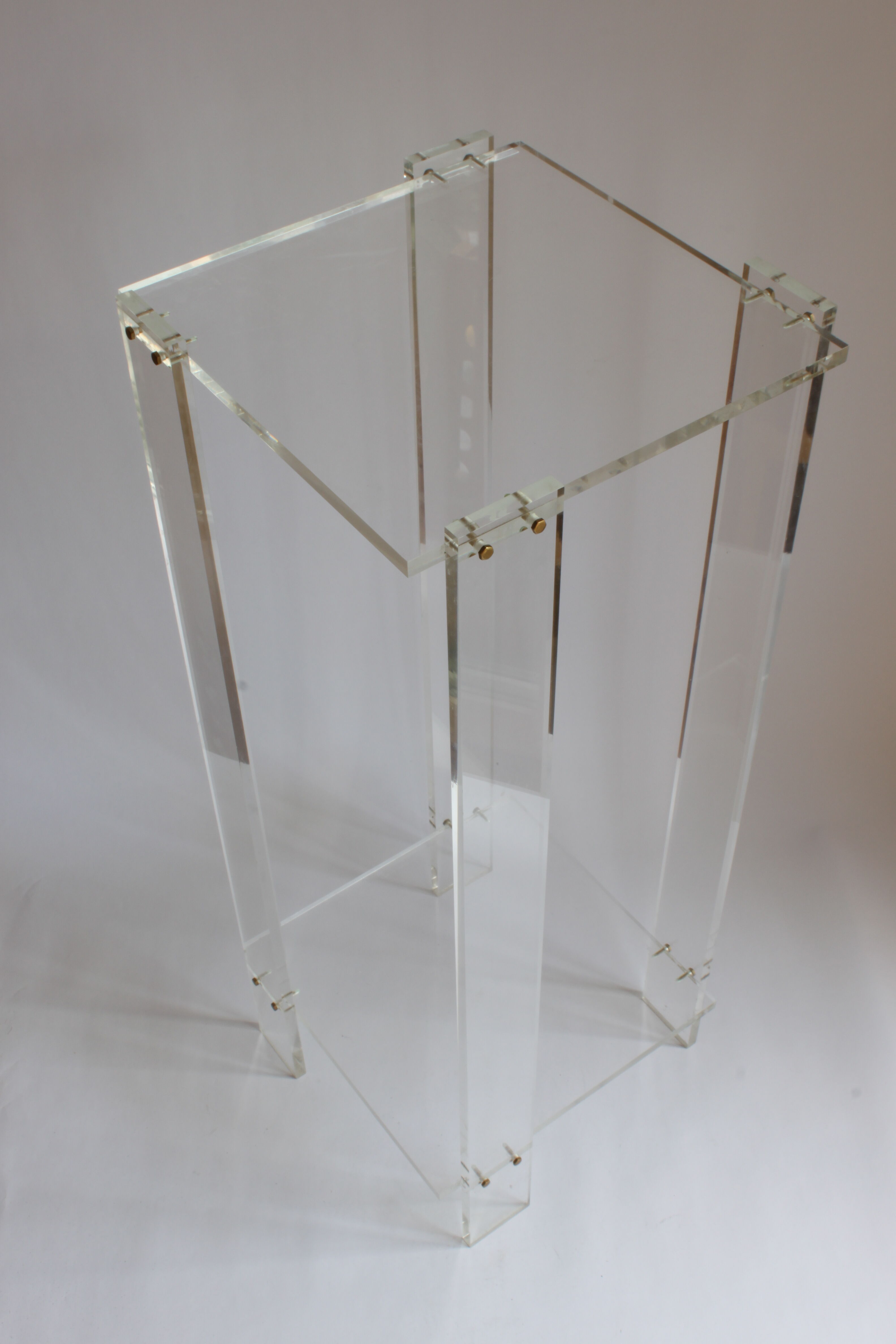 Tall lucite sidetable, 1970s.