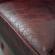 Cowhide leather English chesterfield armchair on wheels