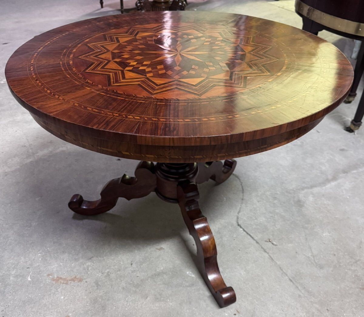 Charles X period gueridon in marquetry.