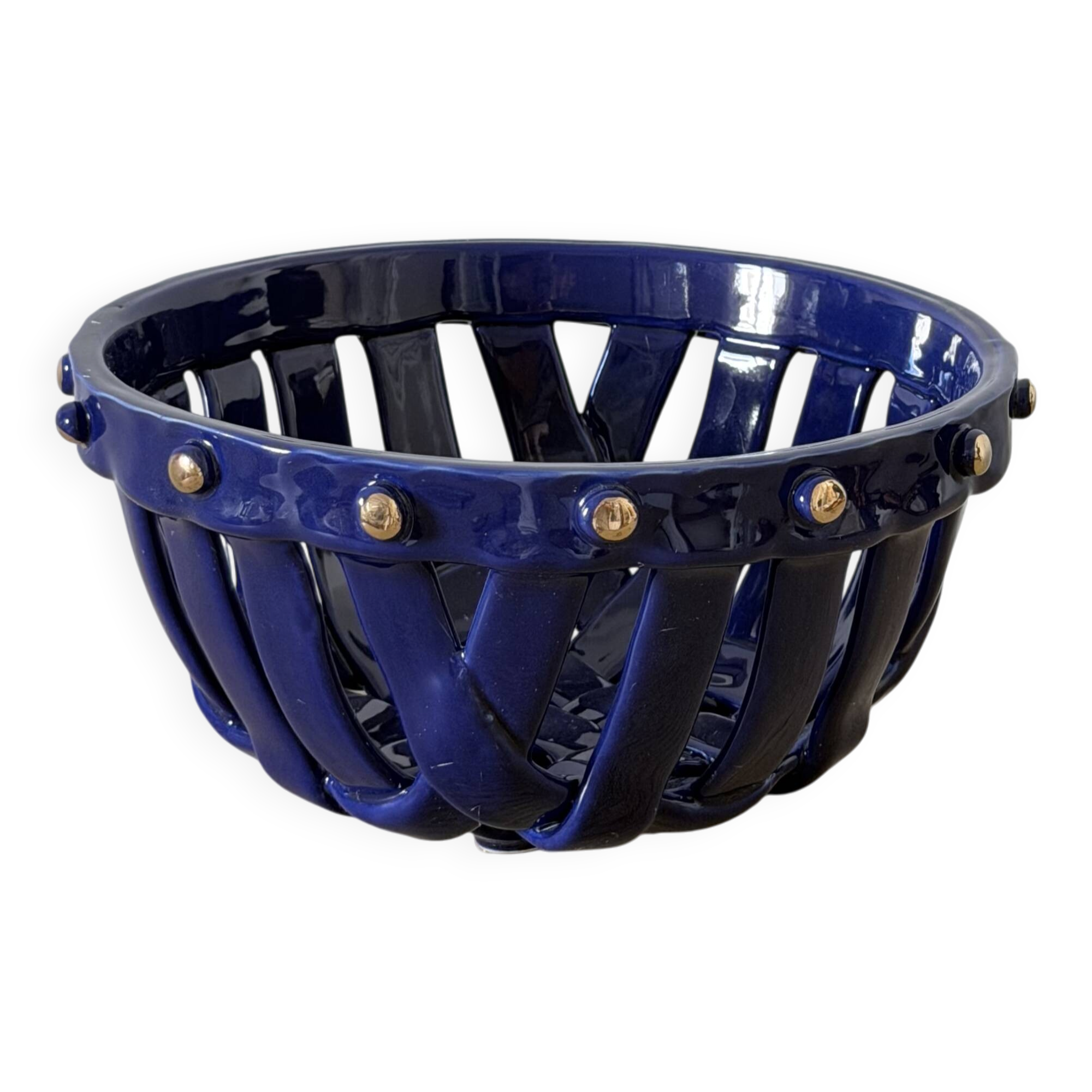 Large cobalt blue openwork bowl with golden studs