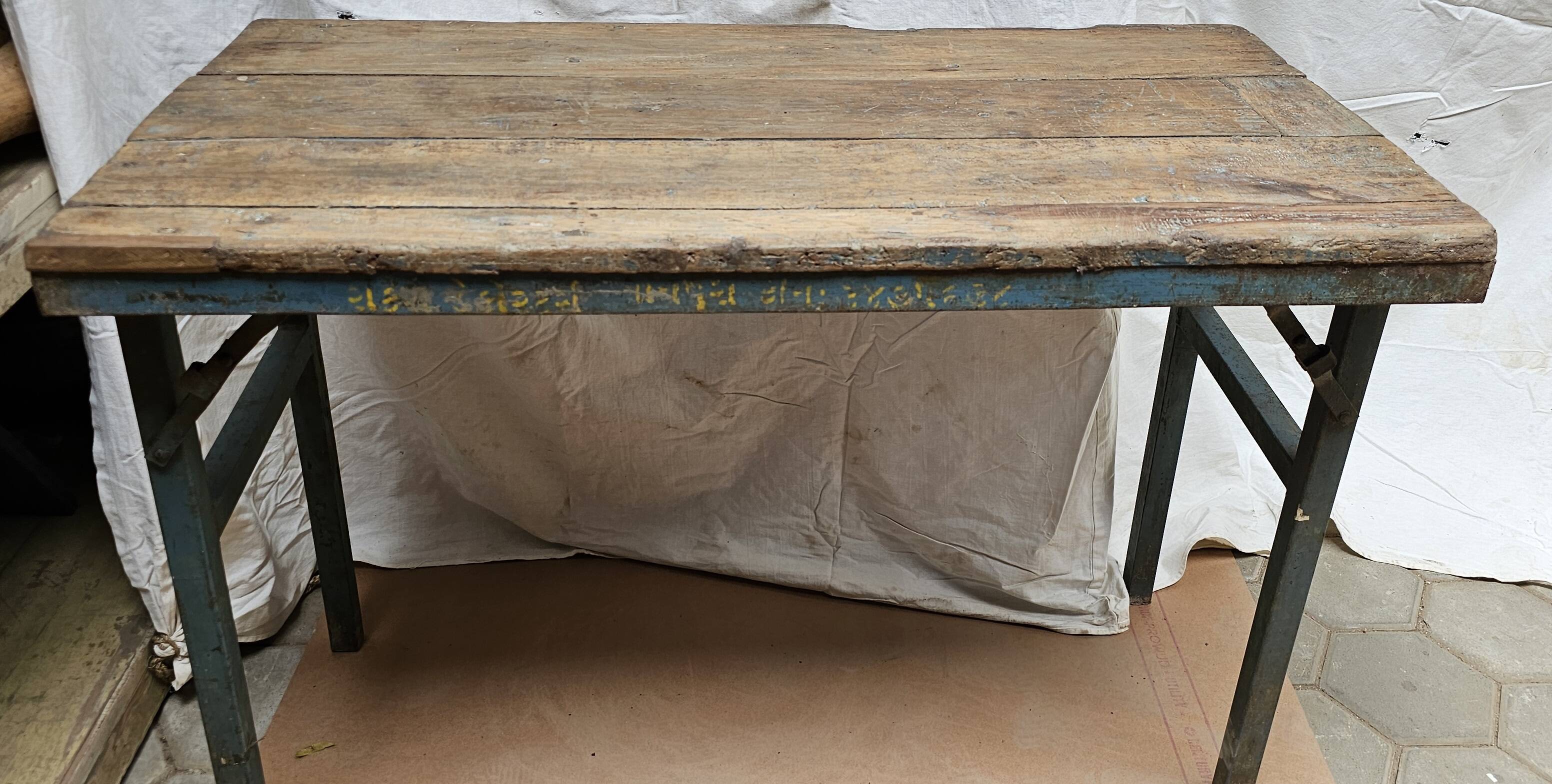 Folding workshop table in teak and wrought iron