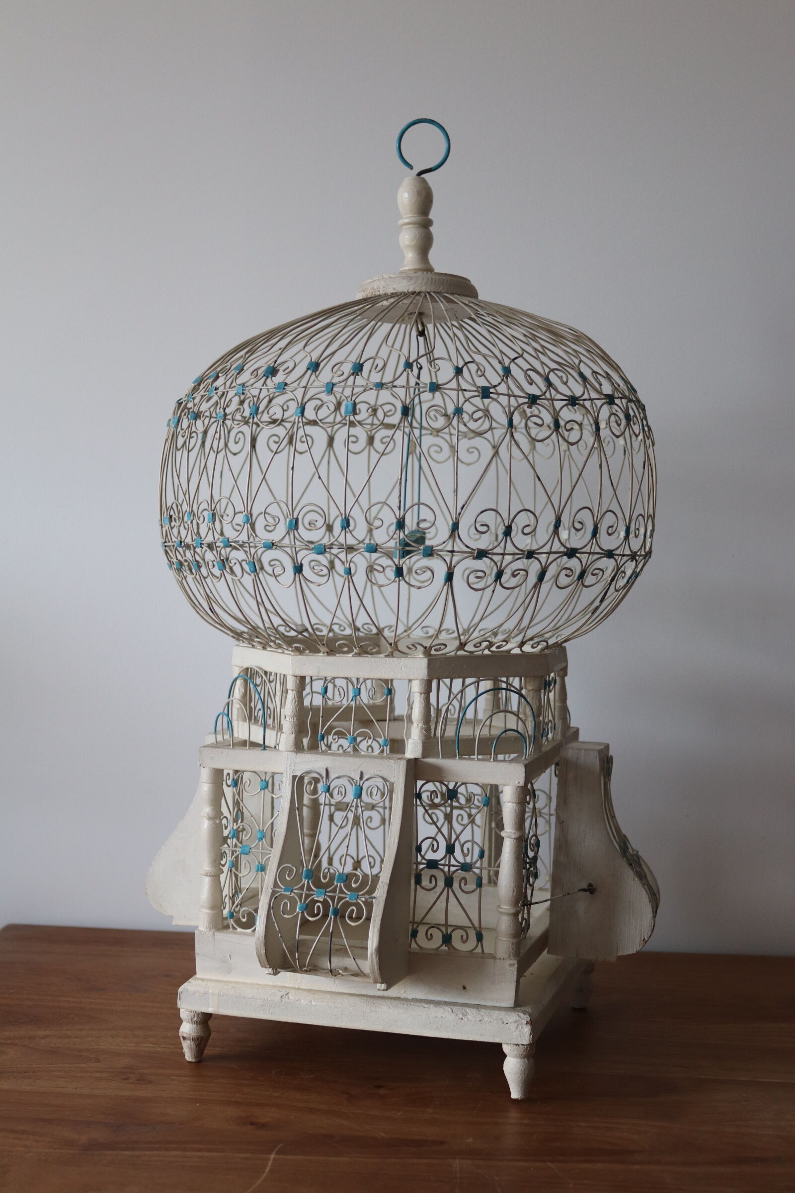 Vintage white and blue birdcage