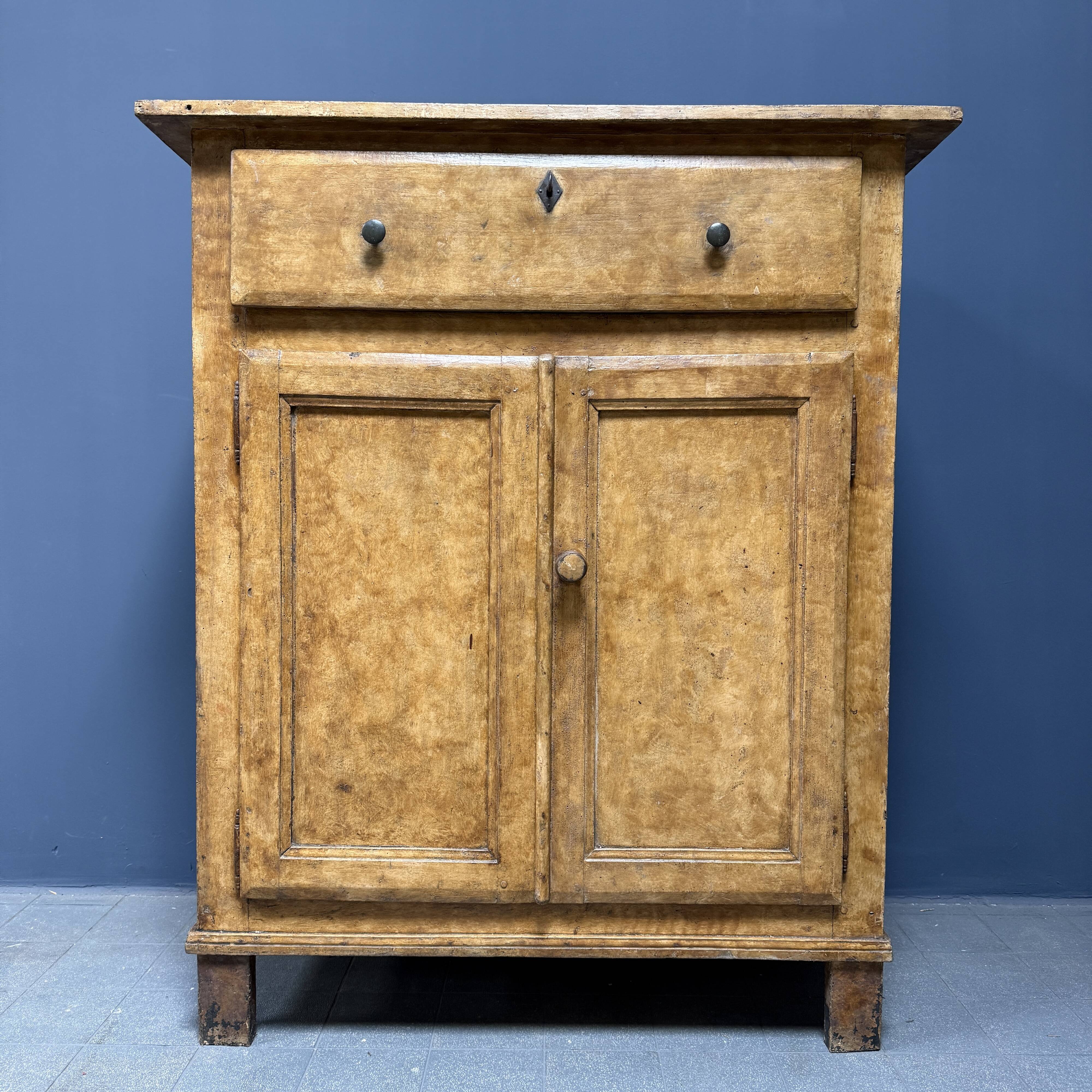 Old marbled ochre yellow French farmhouse cabinet