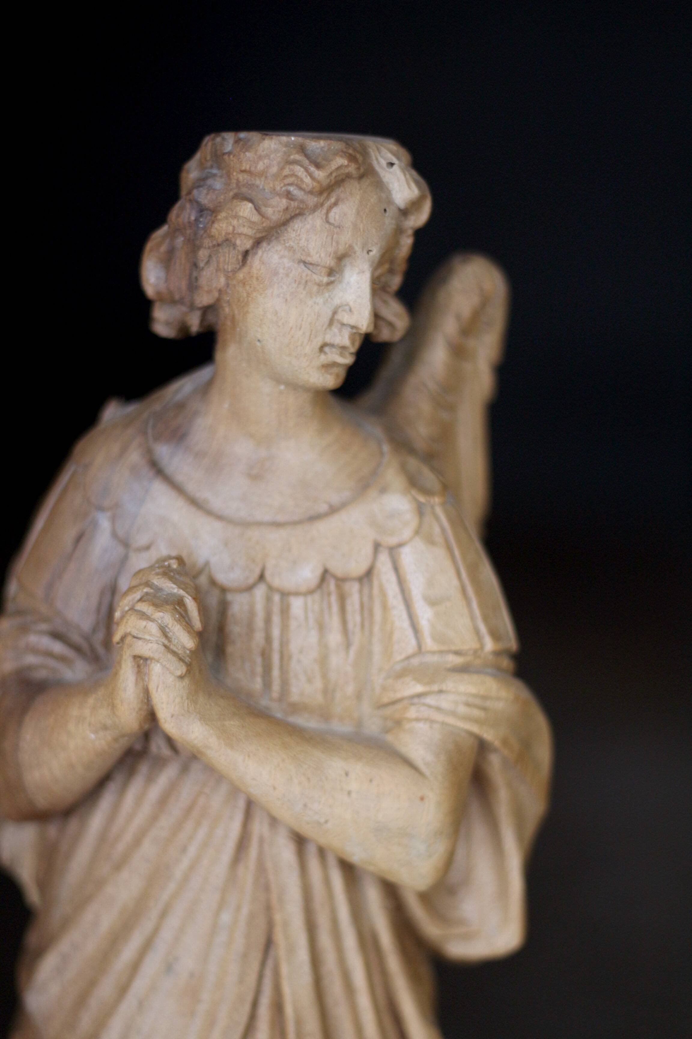 Sacred art: 19th century beechwood cherub statuette