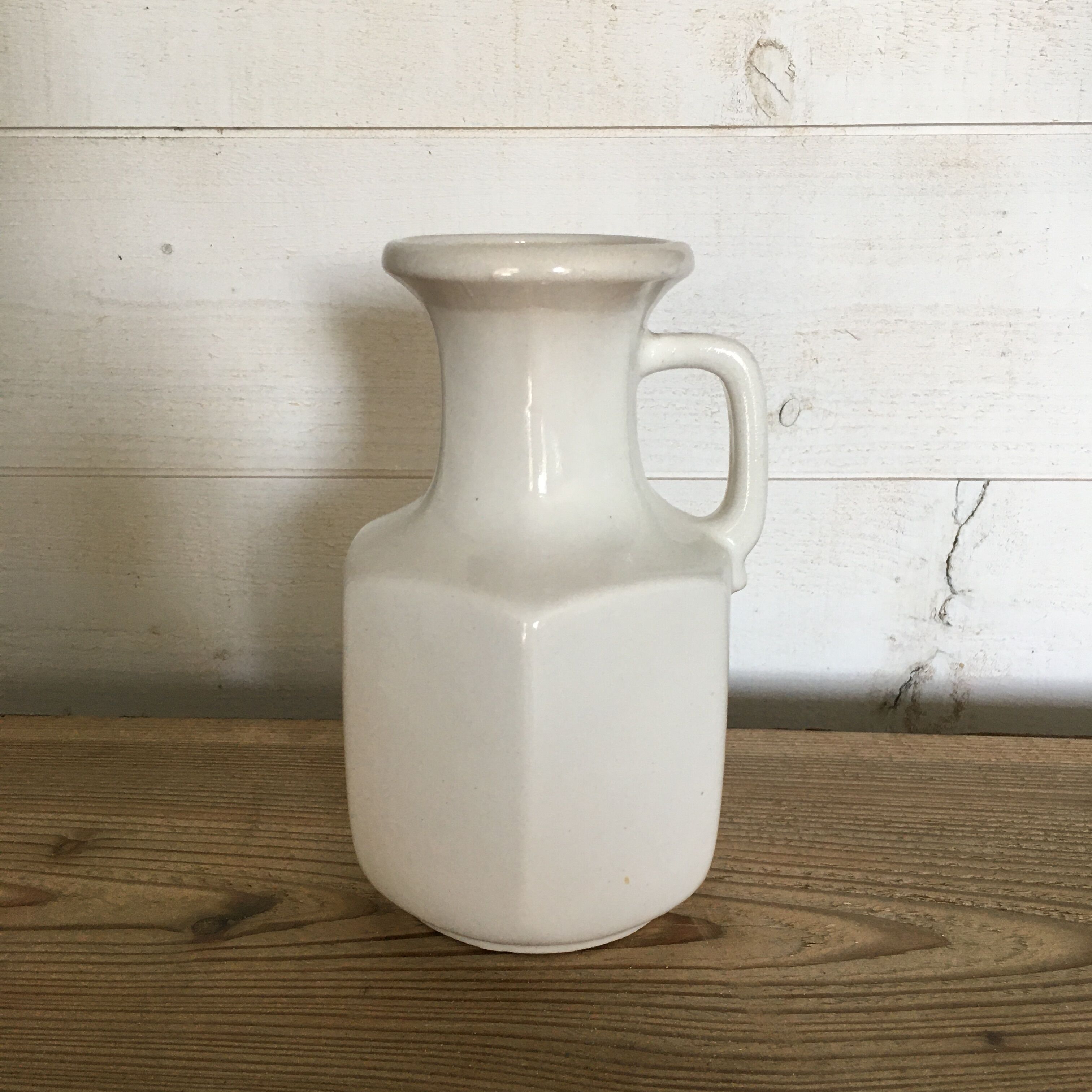 Ivory vase with handle