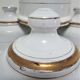 Four white enamelled metal cheese bells early twentieth century